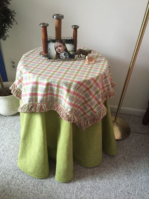 Decorative table with custom tablecloth and overlay