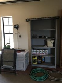 Garage shelving, rubbermaid bin, hoses and more