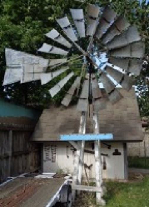 An amazing Circa early 1900's Reburbished Wood and steel windmill -YALE -Blue and white accents -Clutch keeping blades in place -Base: 34" SQ -Platform: 45" SQ -Aprox. 12 FT tall & 15-16 FT to top of blades.  Not sure of the working condition.

**********Buyer is responsible for removing the windmill safely**** 

************Previews by appointment*****