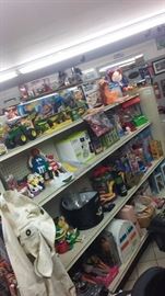 M&M'S DISPENSERS CANDY MACHINES GUMBALL MACHINES SNOWCONE MAKERS AND MANY MORE BARBIES SHIRLEY TEMPLE VHS AND DOLL COLLECTION.