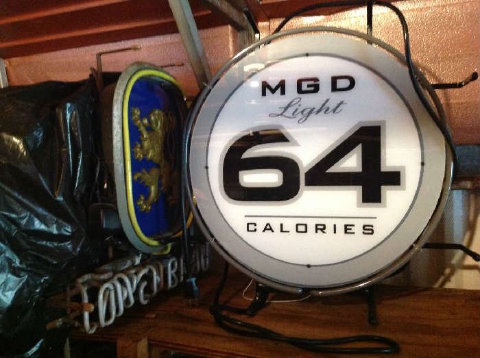 MGD Light 64 Calories Sign $ 80.00
Lowenbrau Neon Sign $ 100.00