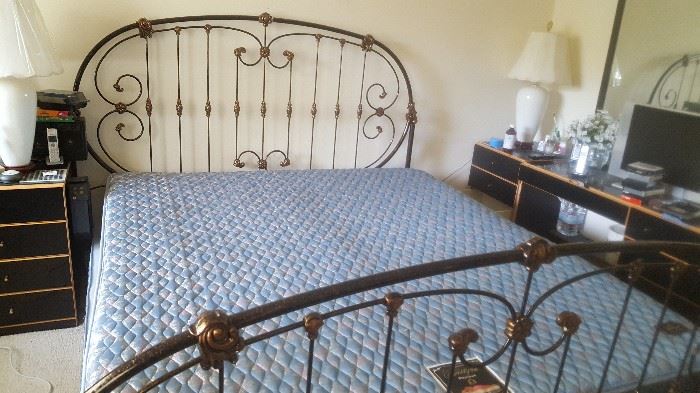 Pretty iron bed and a room full of quality black lacquer cabinets, chests, desk & dresser, great condition.