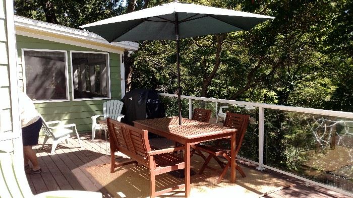 Patio table, chairs and umbrella