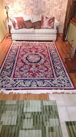 Oriental rug, sofa bed with newer mattress