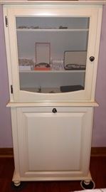 White cabinet with glass door