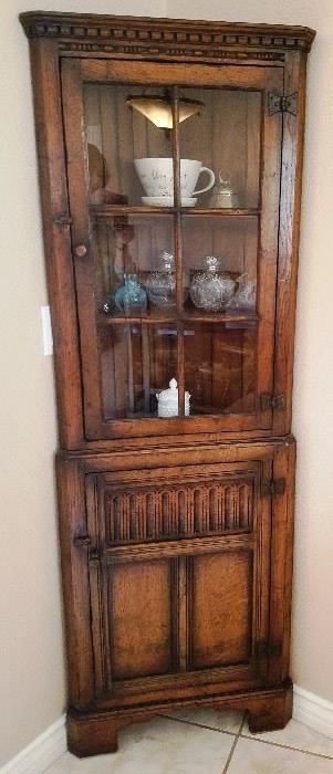 English Oak Corner Cupboard
Top Glass pained door with single turn wood latch
Bottom carved door with single turn wood latch

