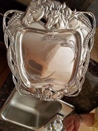 One of Two Decorative Horse Platters
One with Silver Plate Horse Heads on a Round Glass Platter
One all Silver Plate of Horses
