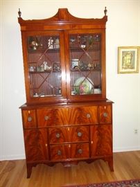 Beautiful 19th century crotch mahogany breakfront dresser in excellent condition.