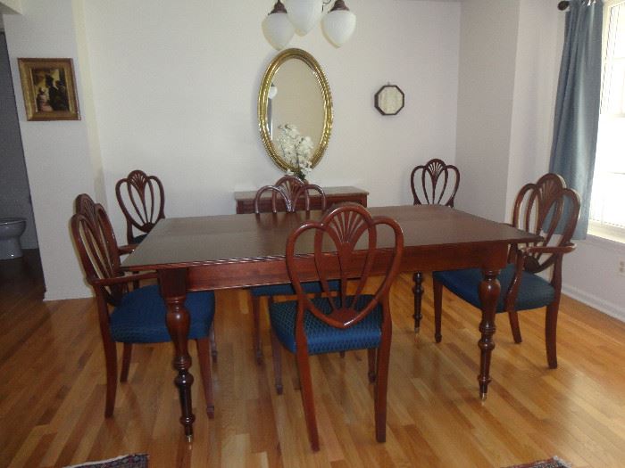 Dining room set with modern table and six antique chairs