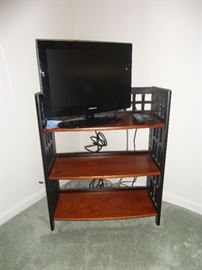 Sylvania television set with one of two matching book cases
