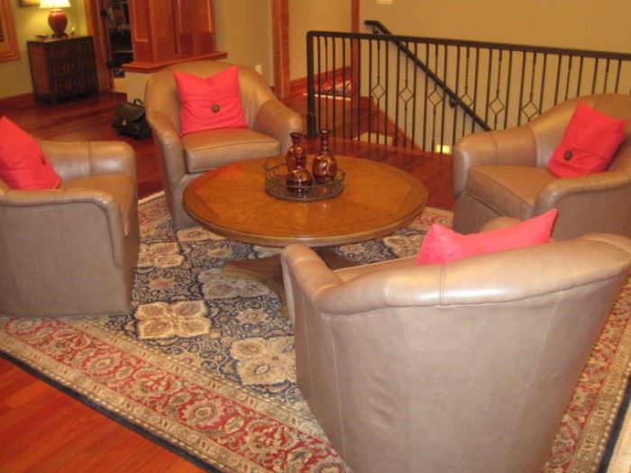 4 Ethan Allen Marino Swivel Leather Armchairs. Mozer Decanters. Round  Coffee Table and Rug are not for sale.   