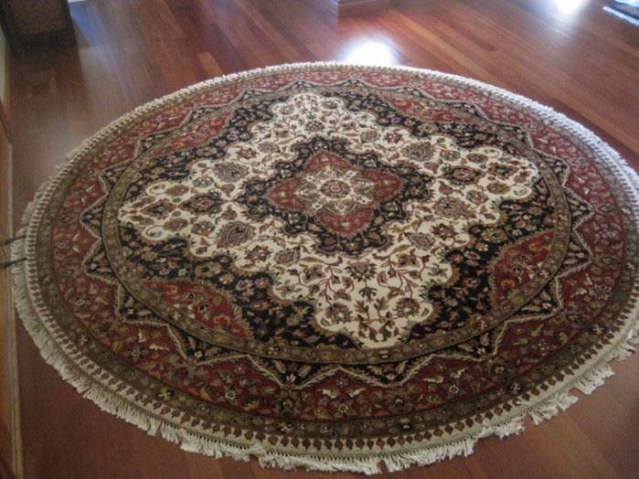 A very nice round wool rug.