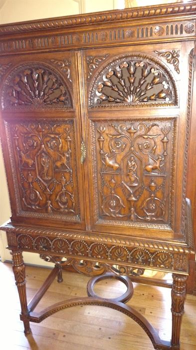 Beautiful 2 pc. carved Cabinet