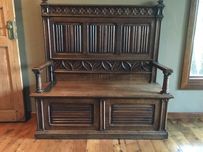French Deacon's Bench with Linen Fold Back and Doors. Intricate carvings. Circa 1800's. Additional photos available, email seller.  53"W x 56"H x 18"D