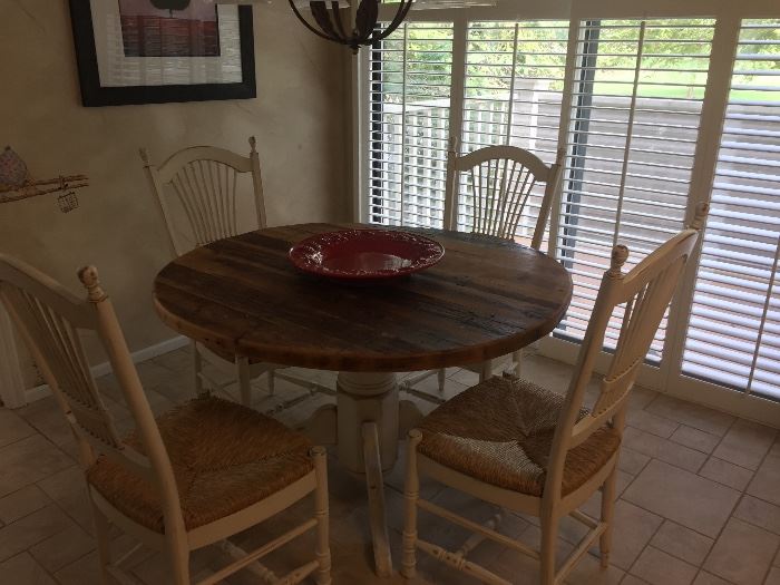 Round kitchen table with 4 ladder-back rush seated chairs