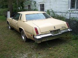 REAR VIEW OF 1977 OLDS CUTLASS