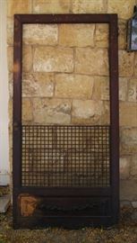 Victorian Oak screen door from a Salt Lake City home with metal grate