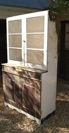 Partially stripped pine cupboard from Utah with original wavy glass