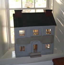 Quaint wood dollhouse