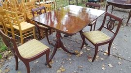 Mahogany table and 4 harp chairs $180
