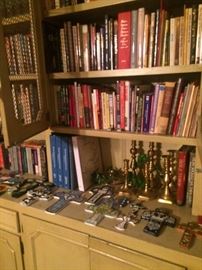 Some of the many books and some of the many crosses