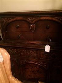 Intrically carved antique chest matches vanity