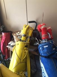 Golf clubs and colorful golf bags