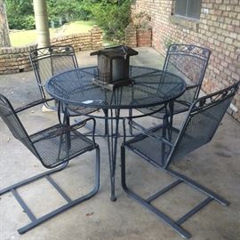 Black patio table and 4 chairs
