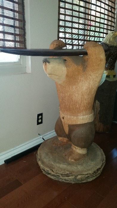 Chain saw carved art
4ft tall bear w/his surf board