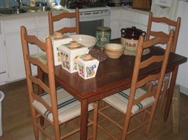 draw leaf table shown with ladderback chairs