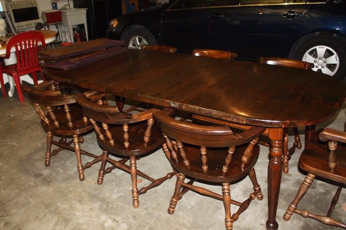 Ethan Allen table & 8 chairs.  3 leaves and felt covers included