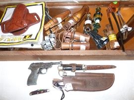Duck calls, cap gun, knives, etc