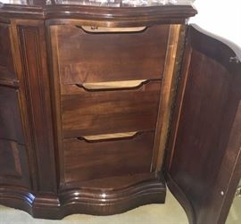 Storage in triple dresser.