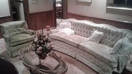 beautiful cushioned chair and sofa, glass top coffee table