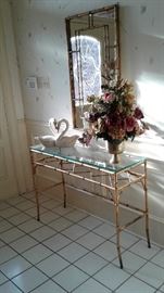 gold trimmed mirror, glass topped wall/hall table 