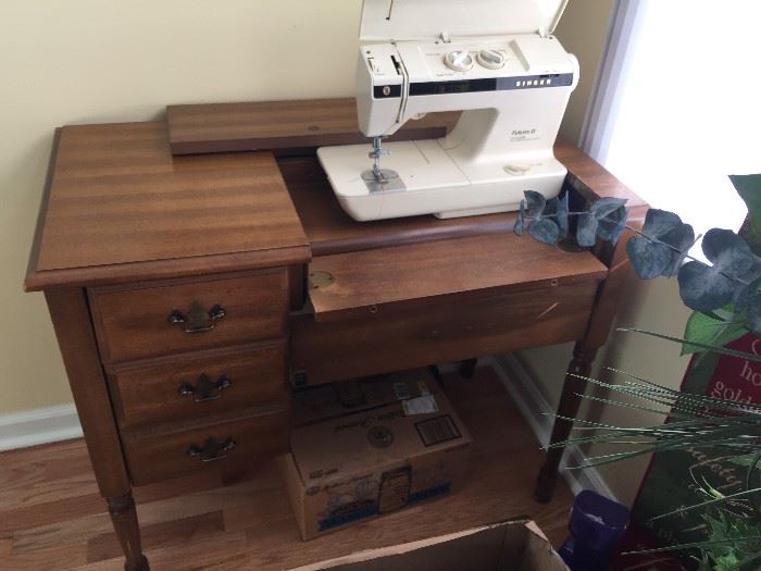 #35 Future II Sewing machine in Cabinet $75 — in Meridianville, Alabama.