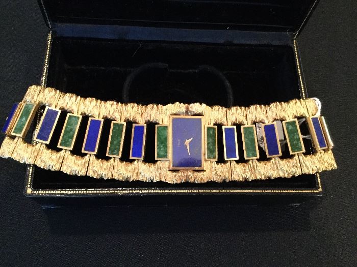 1960 Piaget 18K Nephrite Jade & Malachite watch in original box.  Very heavy...very impressive...and there were very few of them made.  It's a total show stopper!