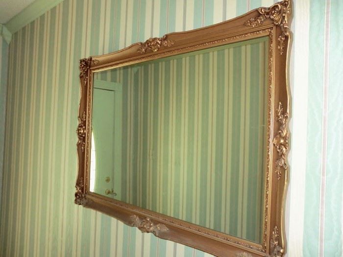 Large gilded beveled mirror