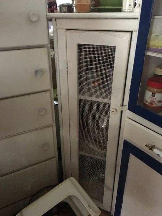 small primitive cupboard