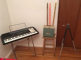 Casio electric organ, Kodak projector and tripod