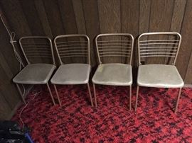 4 matching vintage chairs