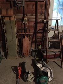 Vintage Toboggan and sled, wooden ladder, and electric blower, vacuum and trimmer 