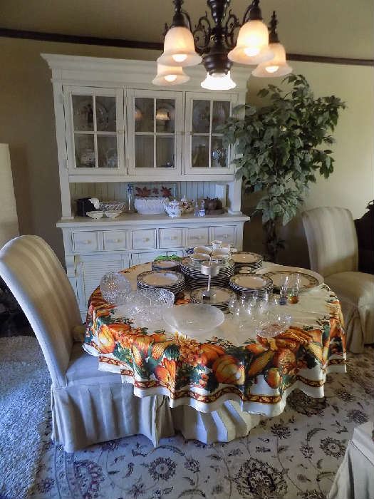4 matching dining chairs. $150 .Beautiful white china cabinet. $325.00.  Carpet for sale .Beautiful woo and silk. Brand is Nourison.    Family  is keeping table. 
