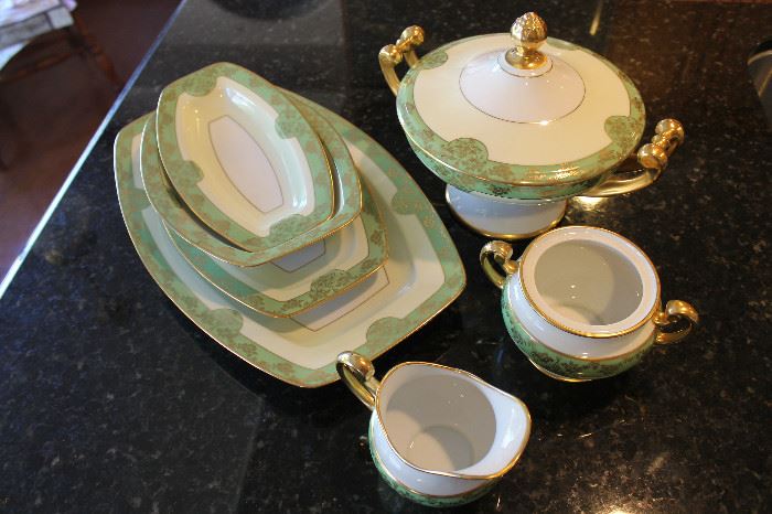 Bavarian porcelain ... Kutschenreuther Gelb ... marked "LHS" with lion insignia ... 2 platters, 2 serving dishes, soup tureen, sugar and creamer.