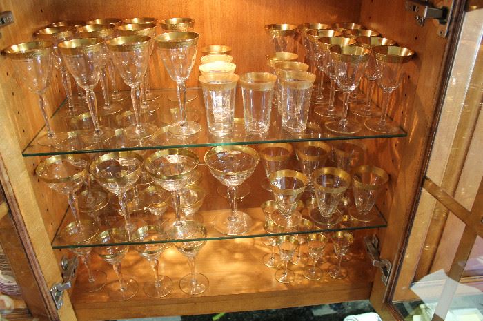 7 sets of gold rim wine, champagne and cordial glasses