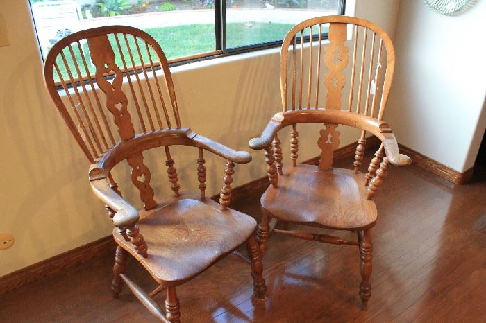 Broad-armed tall Windsor chairs. English. 19th c. Sturdy, comfortable, and in excellent condition.