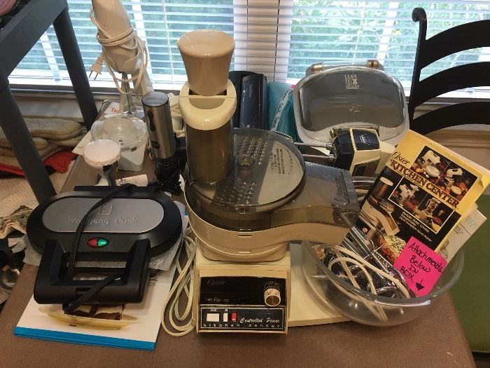 Small Kitchen Appliances - New and Vintage Including     Wolfgang Puck Mini Pie Maker, Vintage Oyster Kitchen Center, Foreman grill, Vintage hand blenders, Vacuum Sealer   