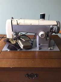 1950-60's sewing machine in furniture