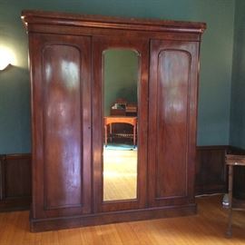 Handsome Large Empire-Style Walnut Armoire with Front Mirror
