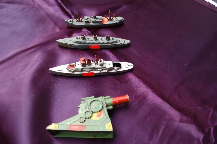 vintage Tootsie toy boats, vintage spring loaded Army cannon, made in USA, aluminum.